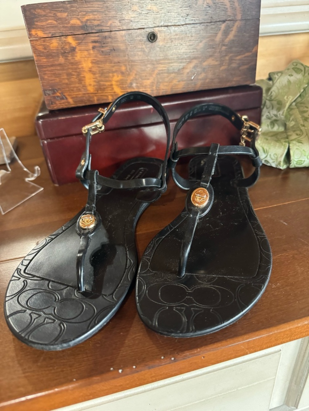 Coach Women's Black T-Strap Jelly Sandals with Gold Accent